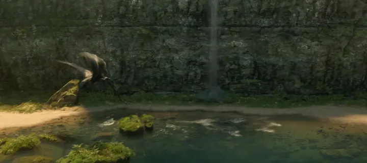 A dragon splashing down into a lake below a waterfall